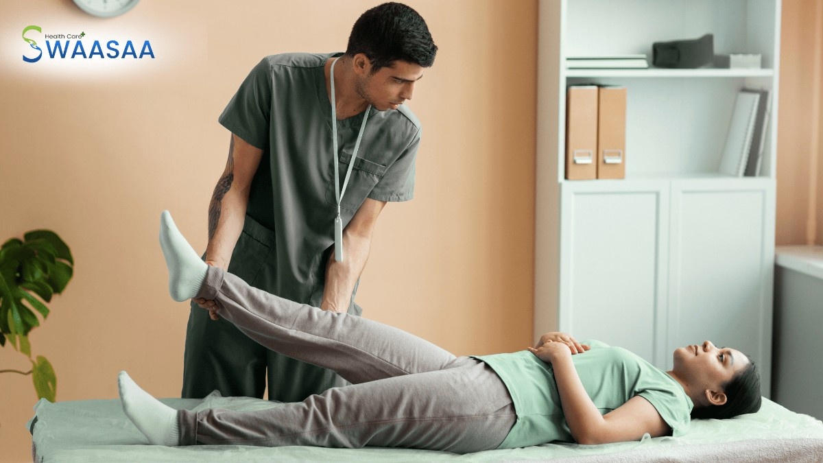 Home Physiotherapist assisting a woman with leg therapy during a physiotherapy session at home