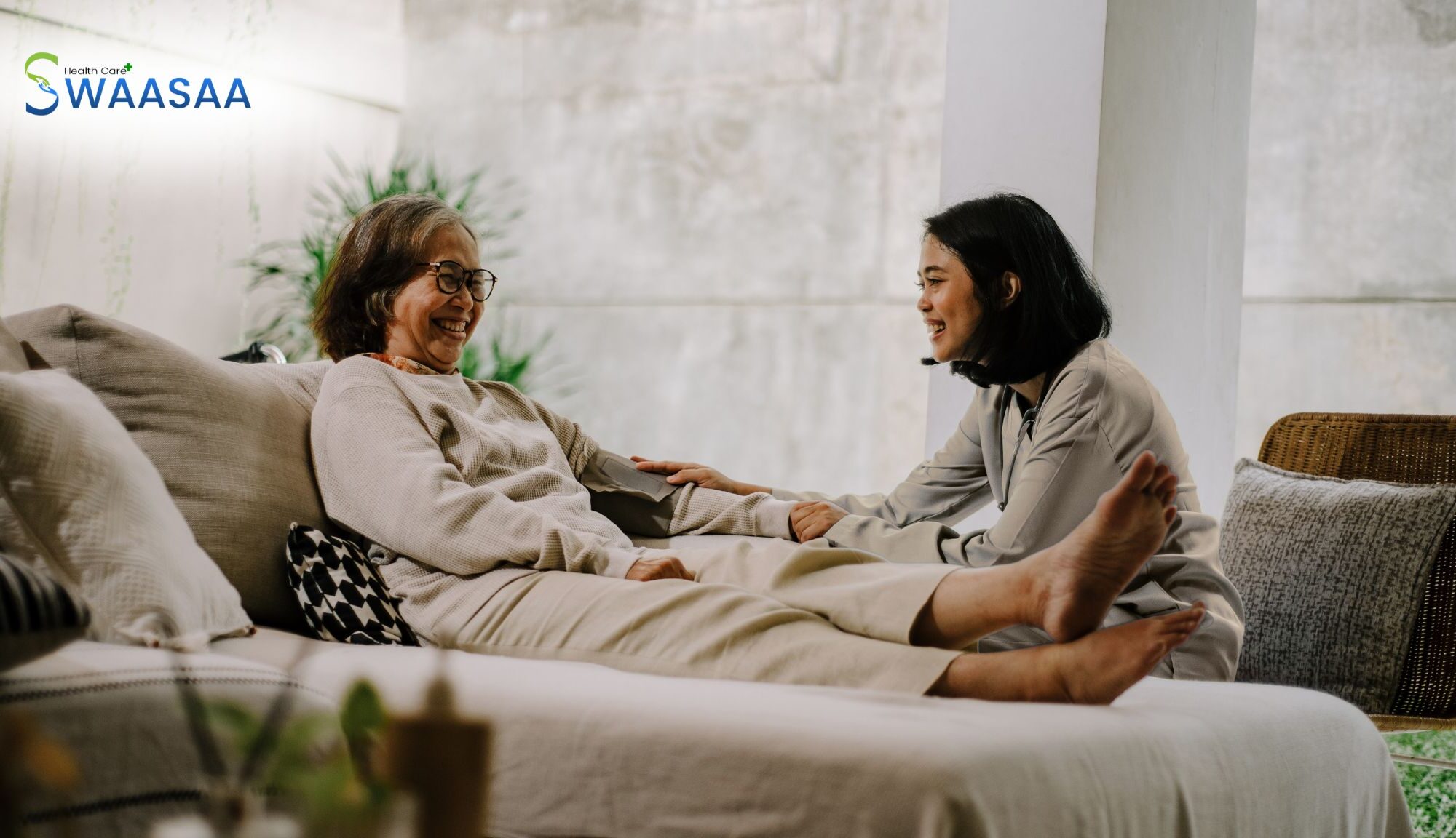 Caregiver providing compassionate support to an elderly patient at home