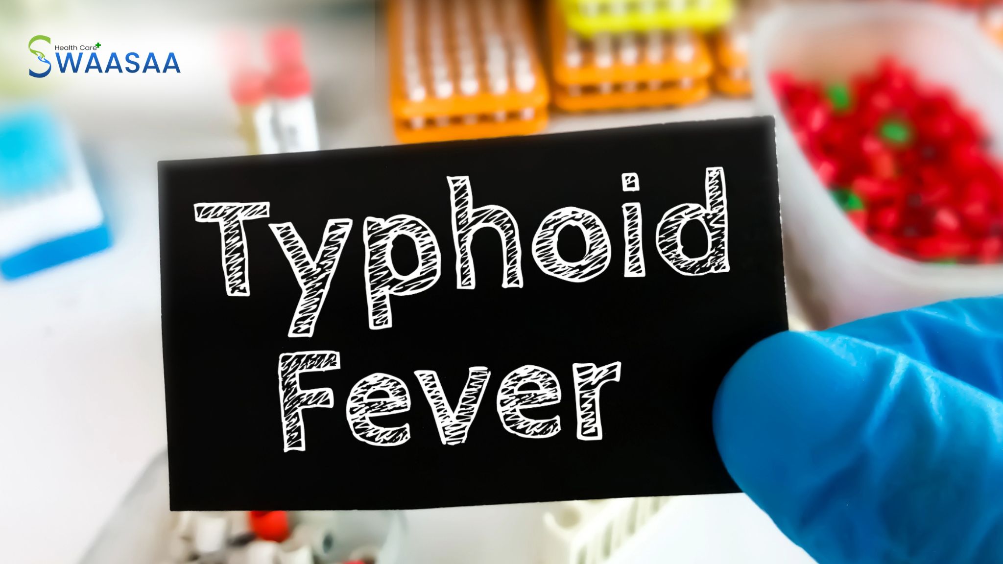 Card with “Typhoid Fever” held in a lab to raise awareness about typhoid symptoms and seasonal illness prevention